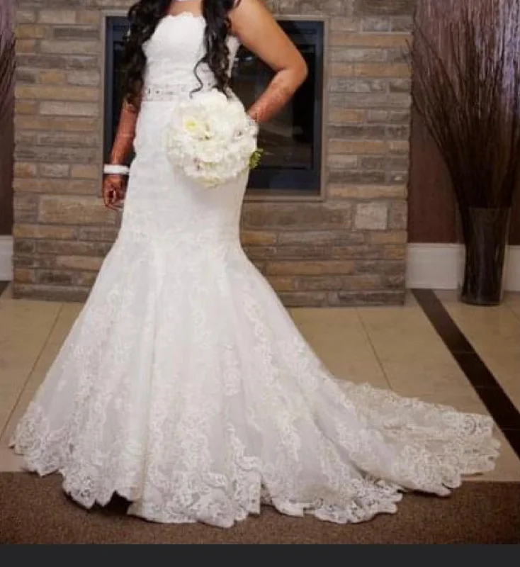 Wedding Dresses with Sheer Sleeve and Sequined Cuffs and Embroidered Bodice and Bow at the Waist for an Elegant and Sparkly LookEnzoani Dakota Wedding Dresses with Sheer Sleeve and Sequined Cuffs and Embroidered Bodice and Bow at the Waist for an Elegant and Sparkly LookEnzoani Dakota