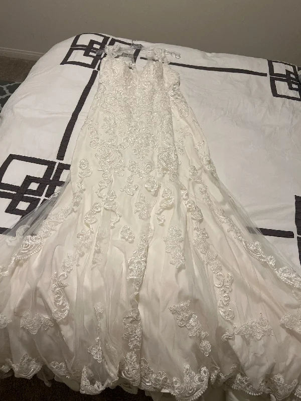 Wedding Dresses with Sheer Panels and Beaded Trim and Bow at the Back and Embroidered Paisley Patterns for a Sexy and Exotic LookEssense of Australia D2352 Wedding Dresses with Sheer Panels and Beaded Trim and Bow at the Back and Embroidered Paisley Patterns for a Sexy and Exotic LookEssense of Australia D2352