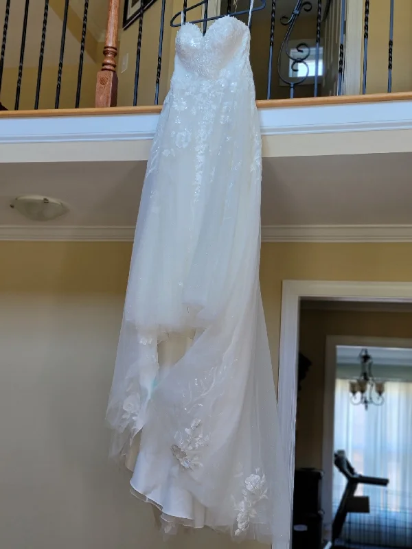 Wedding Dresses with Rhinestone Embellishments and Sheer Sleeves and Tulle Skirt for a Luxurious and Alluring LookEssense of Australia D2943 Wedding Dresses with Rhinestone Embellishments and Sheer Sleeves and Tulle Skirt for a Luxurious and Alluring LookEssense of Australia D2943