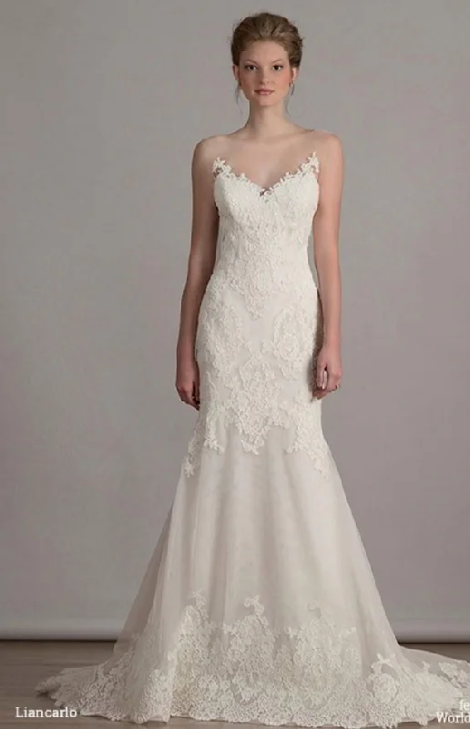 Wedding Dresses with Sheer Sleeve and Sequined Cuffs and Bow at the Waist and Embroidered Skirt and Belt and Embroidered Floral Patterns for an Elegant and Intricate LookLiancarlo LC 6819 Wedding Dresses with Sheer Sleeve and Sequined Cuffs and Bow at the Waist and Embroidered Skirt and Belt and Embroidered Floral Patterns for an Elegant and Intricate LookLiancarlo LC 6819