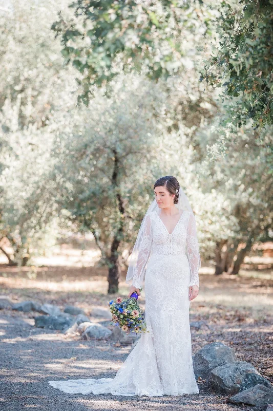 Wedding Dresses with Embroidered Birds and Sequined Floral Motifs and Satin and Lace Combo and Bow at the Waist and Embroidered Floral Patterns for a Nature Inspired and Romantic LookLihi Hod Zoey Wedding Dresses with Embroidered Birds and Sequined Floral Motifs and Satin and Lace Combo and Bow at the Waist and Embroidered Floral Patterns for a Nature Inspired and Romantic LookLihi Hod Zoey