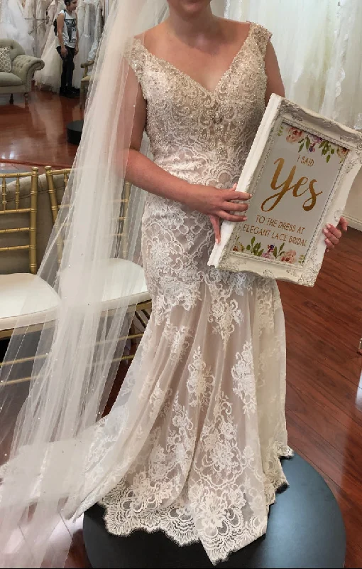 Wedding Dresses with Tiered Skirts and Bow Accents for a Girly AppealMadison James MJ356