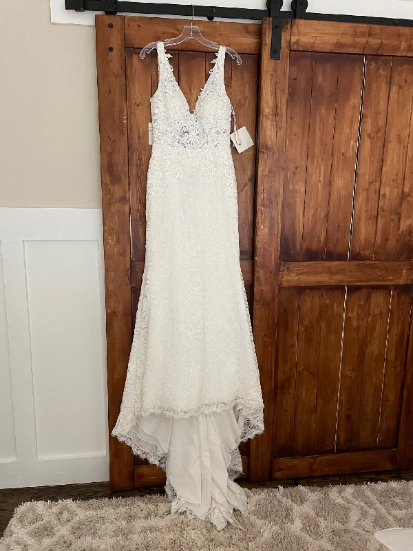 Wedding Dresses with Sequined Geometric Shapes and Lace and Chiffon Blend and Ruffled Sleeves and Belt and Embroidered Skirt for a Modern and Dramatic LookMaggie Sottero Caroline 8MS654 Wedding Dresses with Sequined Geometric Shapes and Lace and Chiffon Blend and Ruffled Sleeves and Belt and Embroidered Skirt for a Modern and Dramatic LookMaggie Sottero Caroline 8MS654