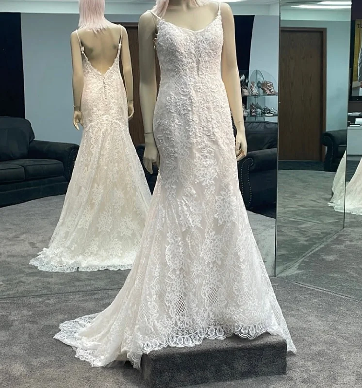 Wedding Dresses with Beaded Floral Wreath on the Bodice and High Low Hem and Belt for a Delicate and Dramatic LookMaggie Sottero Ida 7MN906 Wedding Dresses with Beaded Floral Wreath on the Bodice and High Low Hem and Belt for a Delicate and Dramatic LookMaggie Sottero Ida 7MN906
