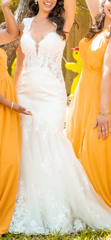 Wedding Dresses with Sheer Sleeve and Sequined Cuffs and Bow at the Waist and Embroidered Skirt and Belt for an Elegant and Intricate LookMaggie Sottero One of a Kind Fit & Flare Wedding Dress Wedding Dresses with Sheer Sleeve and Sequined Cuffs and Bow at the Waist and Embroidered Skirt and Belt for an Elegant and Intricate LookMaggie Sottero One of a Kind Fit & Flare Wedding Dress