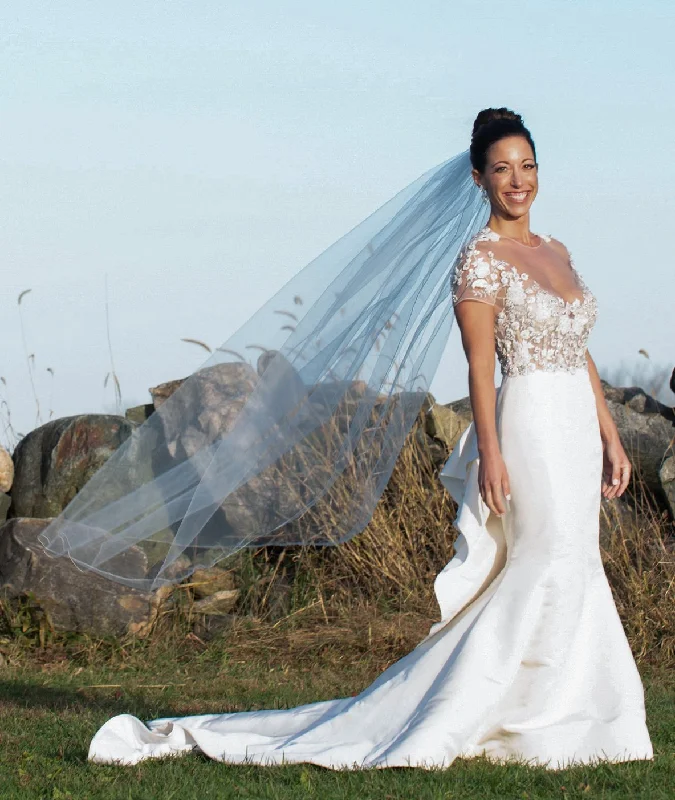 Wedding Dresses with Satin Trimmed Collar and Bow Back and Embroidered Skirt and Sequined Bodice and Belt for a Classic and Glamorous LookMarchesa Lux by Marchesa Wedding Dresses with Satin Trimmed Collar and Bow Back and Embroidered Skirt and Sequined Bodice and Belt for a Classic and Glamorous LookMarchesa Lux by Marchesa
