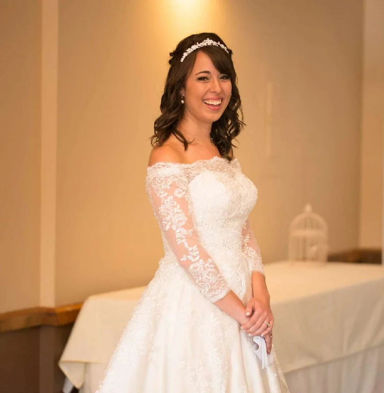 Wedding Dresses with Sequined Hearts and Ruffled Hem and Satin and Lace Combo and Bow at the Waist and Embroidered Floral Patterns and Belt for a Romantic and Sweet LookMary's Bridal 6360