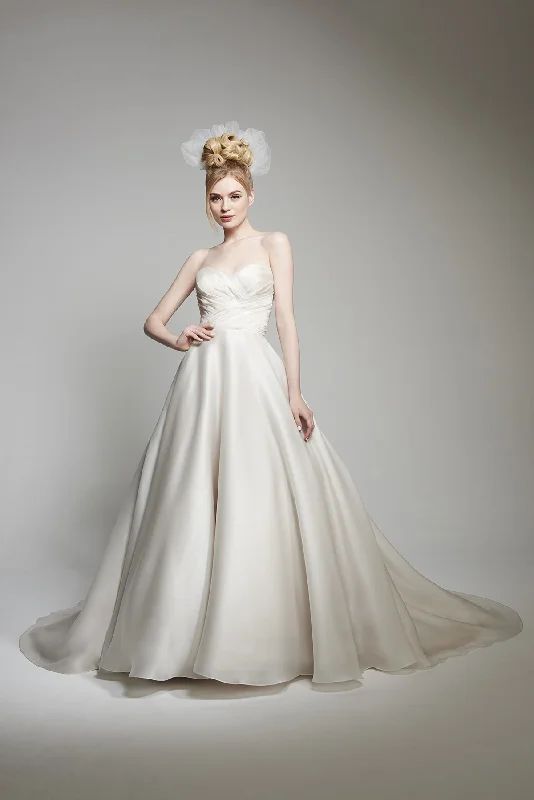 Wedding Dresses with Embroidered Birds and Sequined Floral Motifs and Satin and Lace Combo and Bow at the Waist and Embroidered Floral Patterns for a Nature Inspired and Romantic LookMatthew Christopher Abigail