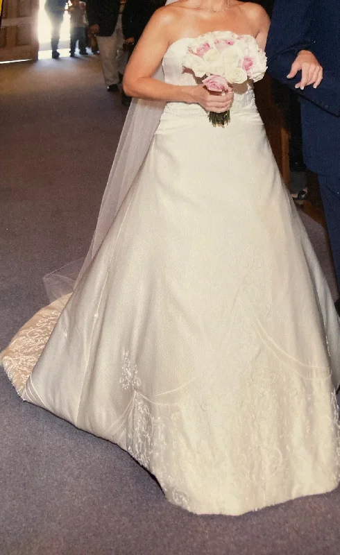 Wedding Dresses with Sheer Panels and Beaded Trim and Embroidered Paisley Patterns and Ruffled Hem and Belt and Embroidered Floral Patterns for a Sultry and Exotic LookMatthew Christopher Roman Holiday