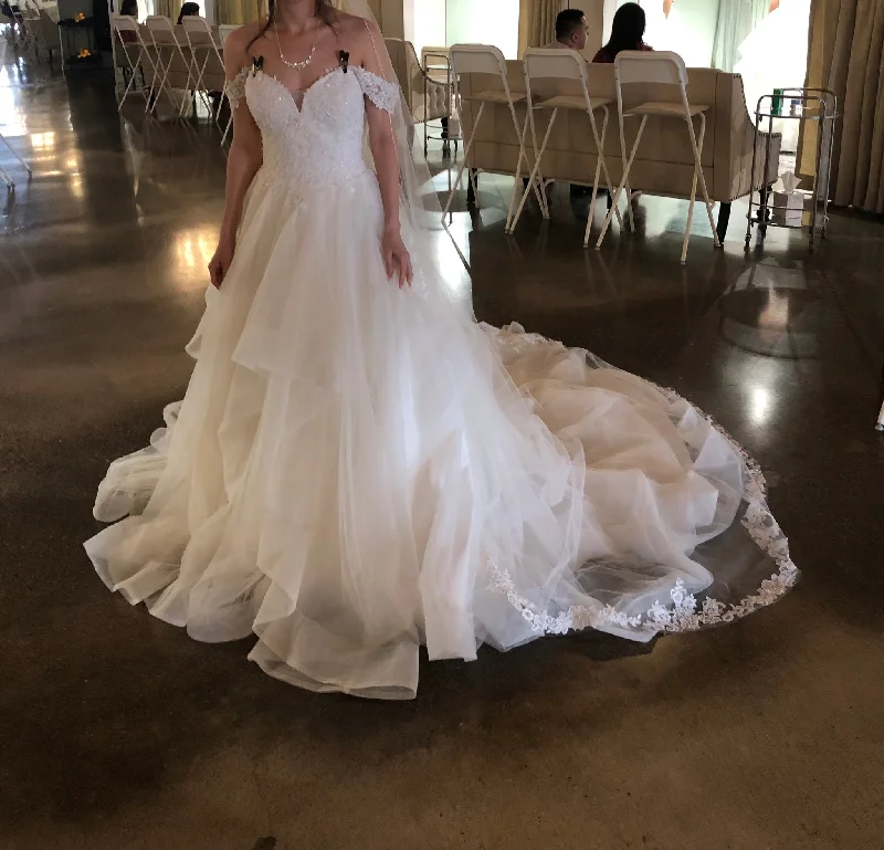 Wedding Dresses with Ruffled Sleeveless Top and Sequined Bodice and Tulle Skirt and Beaded Waistband and Bow at the Back and Embroidered Floral Patterns for a Dramatic and Glamorous LookMia Solano Patrice M1880Z