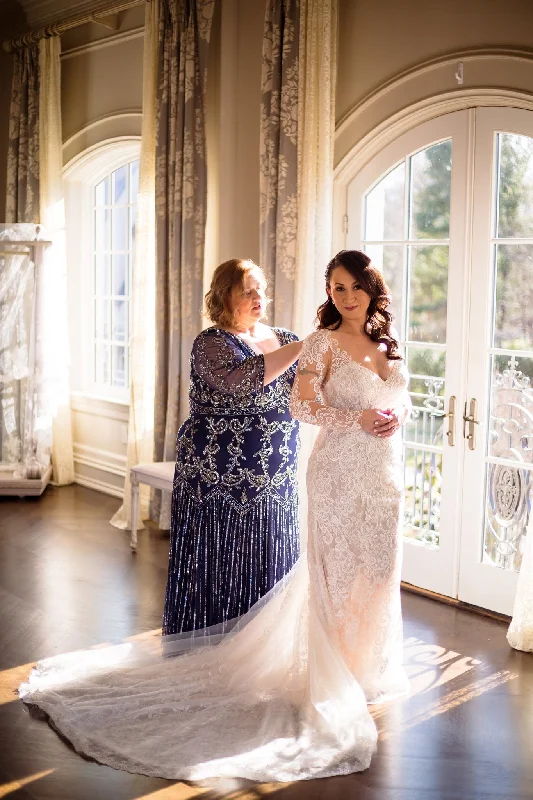 Wedding Dresses with High Low Sheer Skirt and Embroidered Birds and Sequined Floral Motifs for a Nature Inspired and Dramatic LookMichelle Roth Walden Wedding Dresses with High Low Sheer Skirt and Embroidered Birds and Sequined Floral Motifs for a Nature Inspired and Dramatic LookMichelle Roth Walden