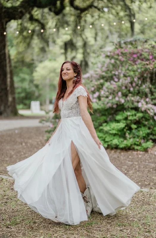 Wedding Dresses with Tulle Overlay and Beaded Bodice and High Low Hem and Embroidered Birds for a Dramatic and Graceful LookMikaella 2352 Wedding Dresses with Tulle Overlay and Beaded Bodice and High Low Hem and Embroidered Birds for a Dramatic and Graceful LookMikaella 2352