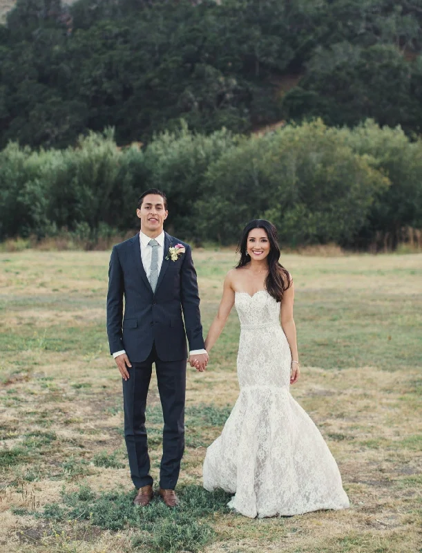 Wedding Dresses with Beaded Waistbands and Tiered Skirts and Lace Overlay for a Glamorous and Feminine LookMonique Lhuillier Farren Wedding Dresses with Beaded Waistbands and Tiered Skirts and Lace Overlay for a Glamorous and Feminine LookMonique Lhuillier Farren