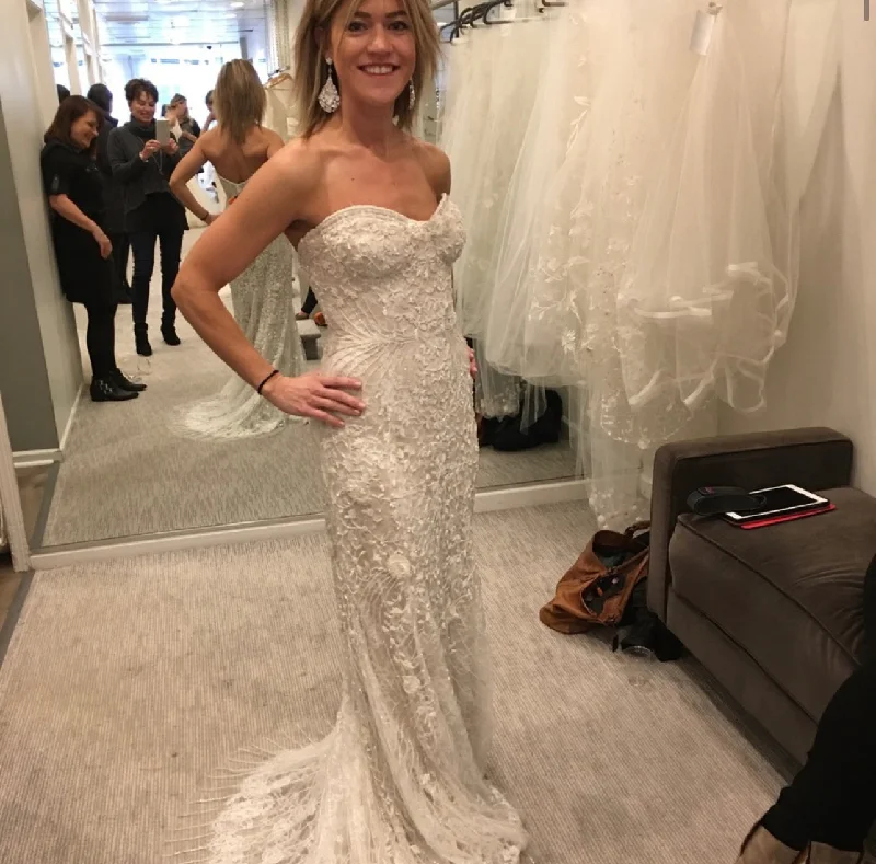 Wedding Dresses with Sheer Panels and Sequined Trim and Belt for a Sultry and Sparkly LookMonique Lhuillier Gwyneth Wedding Dresses with Sheer Panels and Sequined Trim and Belt for a Sultry and Sparkly LookMonique Lhuillier Gwyneth