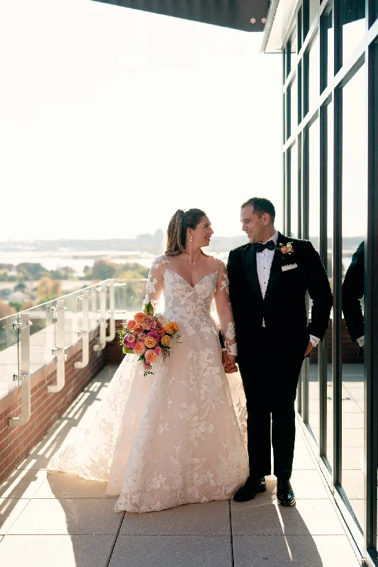 Wedding Dresses with High Neck and Embroidered Back and Sheer Sleeves for a Modest and Intricate LookMonique Lhuillier Maeve Wedding Dresses with High Neck and Embroidered Back and Sheer Sleeves for a Modest and Intricate LookMonique Lhuillier Maeve
