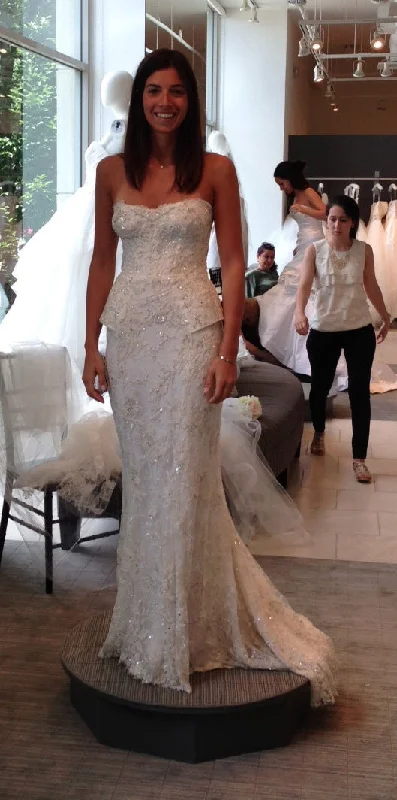 Wedding Dresses with Pleated Tulle Skirt and Sequined Geometric Shapes and Lace Overlay and Bow at the Waist and Embroidered Floral Patterns for a Princess and Feminine LookMonique Lhuillier Opulence Wedding Dresses with Pleated Tulle Skirt and Sequined Geometric Shapes and Lace Overlay and Bow at the Waist and Embroidered Floral Patterns for a Princess and Feminine LookMonique Lhuillier Opulence