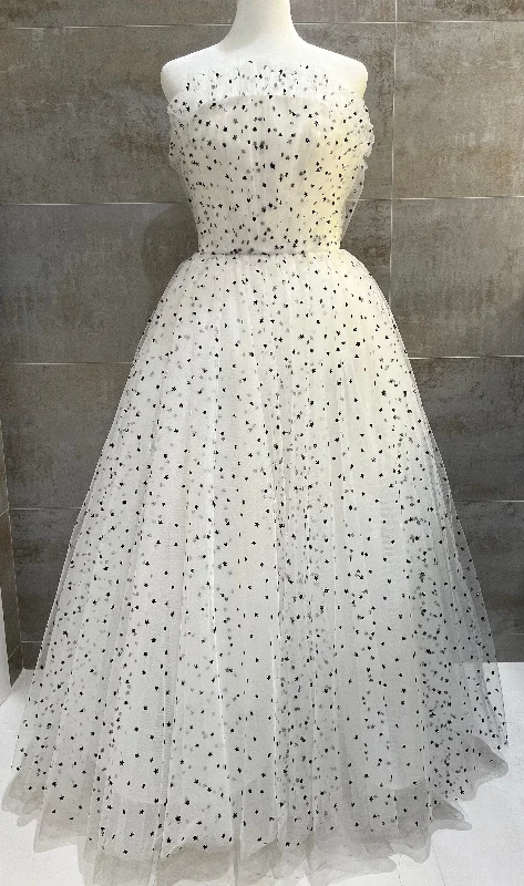 Wedding Dresses with Sequined Dots and Sheer Skirt for a Playful and Sultry LookMonique Lhuillier Ruffled Strapless Star Tulle Tea Length Dress Wedding Dresses with Sequined Dots and Sheer Skirt for a Playful and Sultry LookMonique Lhuillier Ruffled Strapless Star Tulle Tea Length Dress