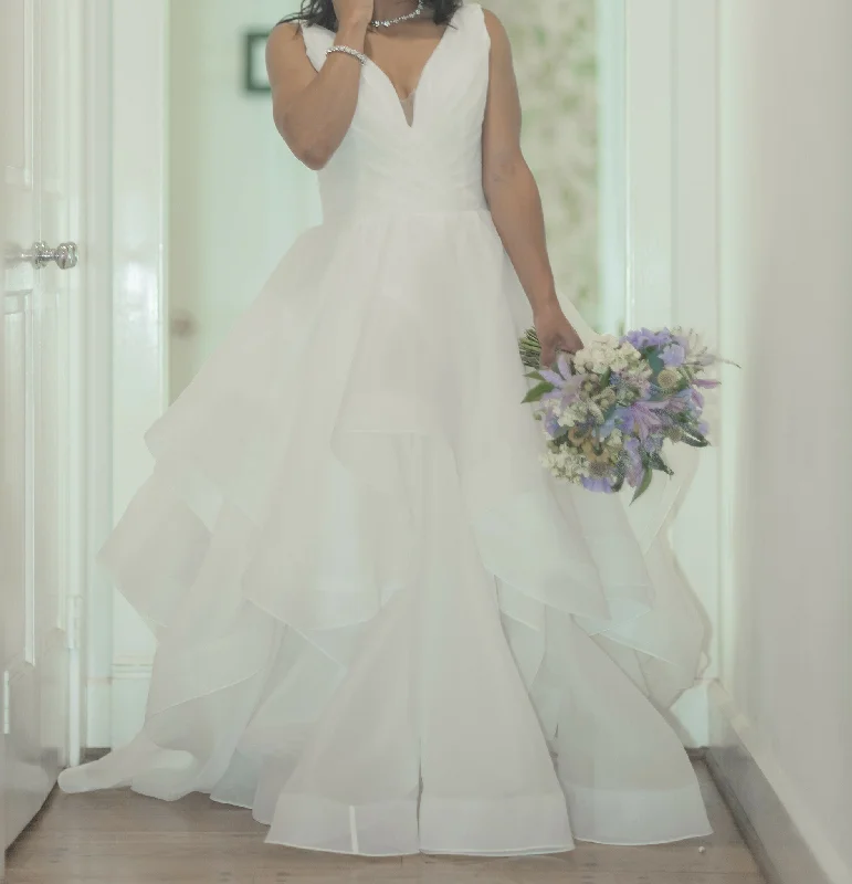 Wedding Dresses with Ruffled Sleeveless Top and Sequined Bodice and Tulle Skirt and Beaded Waistband and Bow at the Back for a Dramatic and Glamorous LookMori Lee Milly 5577 Wedding Dresses with Ruffled Sleeveless Top and Sequined Bodice and Tulle Skirt and Beaded Waistband and Bow at the Back for a Dramatic and Glamorous LookMori Lee Milly 5577