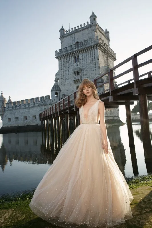 Wedding Dresses with Embroidered Stars and Sequined Dots and Sheer Sleeve and Belt for a Celestial and Playful LookNetta BenShabu Jess/Tess Wedding Dresses with Embroidered Stars and Sequined Dots and Sheer Sleeve and Belt for a Celestial and Playful LookNetta BenShabu Jess/Tess