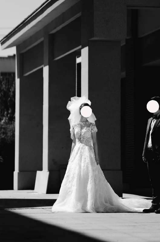 One Shoulder Wedding Dresses with Ruffled Sleeve for a Dramatic EffectOleg Cassini CWG833 One Shoulder Wedding Dresses with Ruffled Sleeve for a Dramatic EffectOleg Cassini CWG833