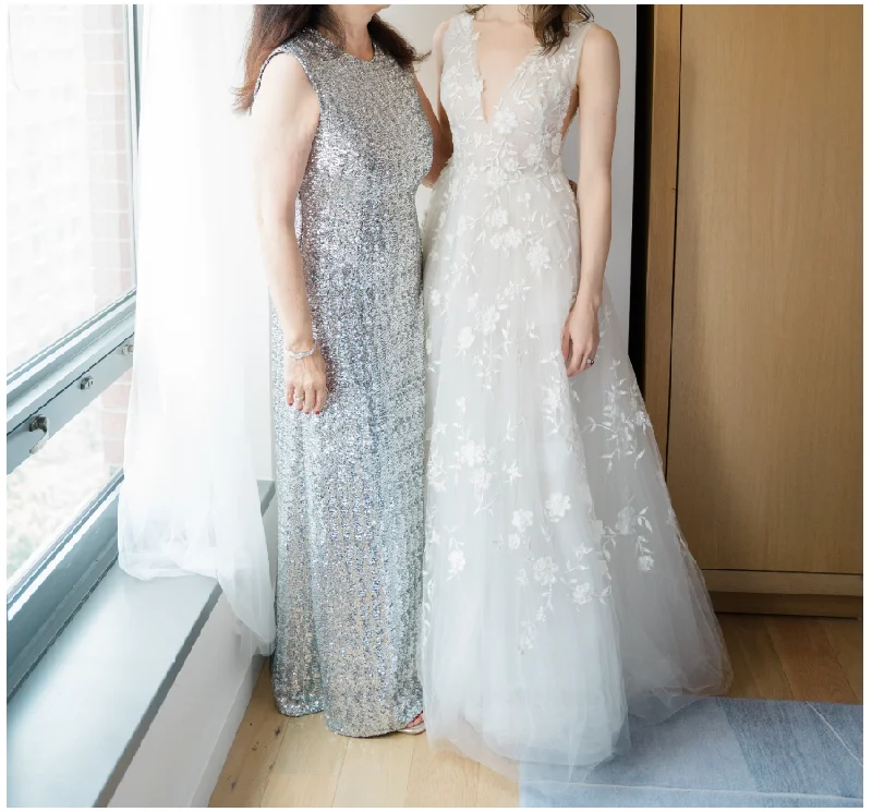 Wedding Dresses with Pleated Tulle Skirt and Sequined Geometric Shapes and Lace Overlay and Bow at the Waist for a Princess and Feminine LookOscar de la Renta Luvi Wedding Dresses with Pleated Tulle Skirt and Sequined Geometric Shapes and Lace Overlay and Bow at the Waist for a Princess and Feminine LookOscar de la Renta Luvi