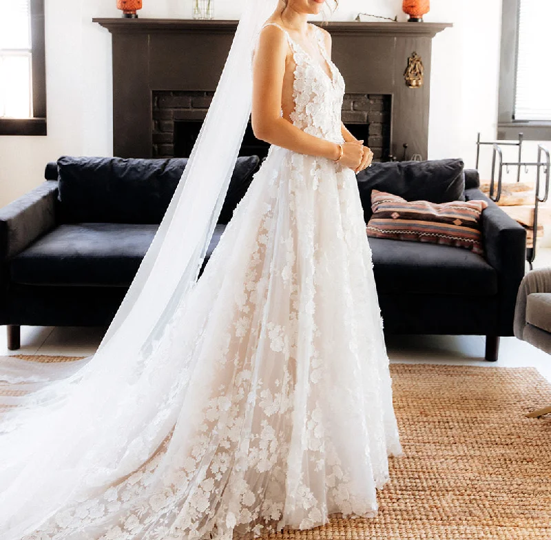 Wedding Dresses with Embroidered Stars and Sequined Dots and Sheer Sleeve and Belt for a Celestial and Playful LookOther Angela Wedding Dresses with Embroidered Stars and Sequined Dots and Sheer Sleeve and Belt for a Celestial and Playful LookOther Angela