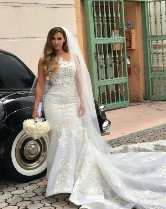 Wedding Dresses with Sequined Star Motifs and Sheer Sleeve and Ruffled Hem and Belt for a Celestial and Elegant LookOther Bespoke Sleeveless Illusion Lace Mermaid Wedding Dresses with Sequined Star Motifs and Sheer Sleeve and Ruffled Hem and Belt for a Celestial and Elegant LookOther Bespoke Sleeveless Illusion Lace Mermaid