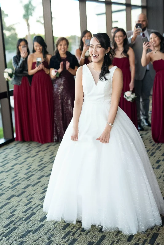 Wedding Dresses with Embroidered Stars and Sequined Dots and Sheer Sleeve and Belt for a Celestial and Playful LookOther Sleeveless Ball Gown Wedding Dress