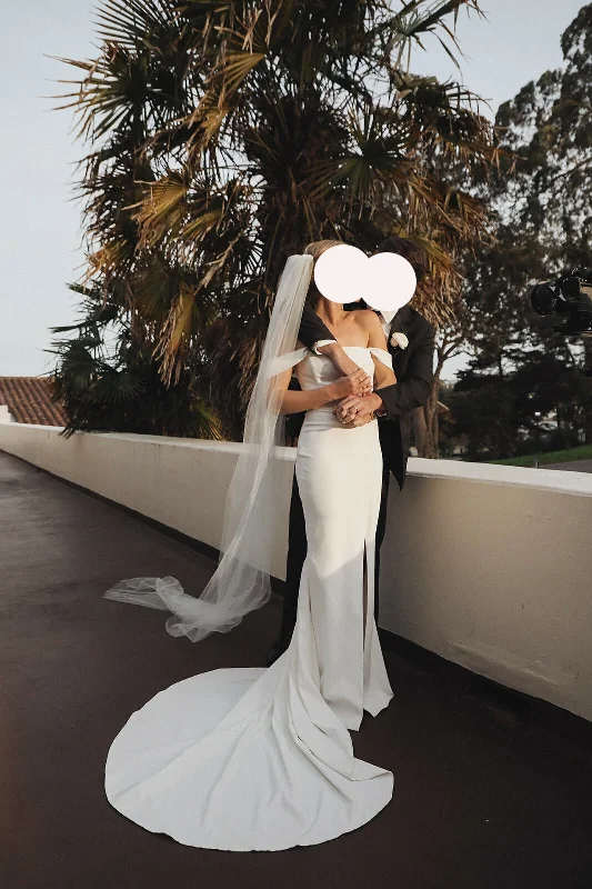 Wedding Dresses with Bell Sleeves and Ruffled Skirt for a Playful LookOther Zoe