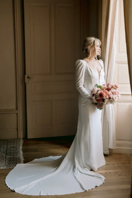 Wedding Dresses with Embroidered Birds and Sequined Floral Motifs and Satin and Lace Combo and Bow at the Waist and Embroidered Floral Patterns for a Nature Inspired and Romantic LookPronovias Antelope Wedding Dresses with Embroidered Birds and Sequined Floral Motifs and Satin and Lace Combo and Bow at the Waist and Embroidered Floral Patterns for a Nature Inspired and Romantic LookPronovias Antelope