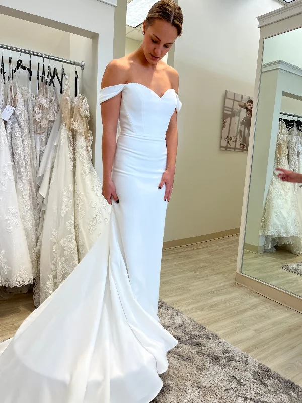 Wedding Dresses with Sheer Panels and Beaded Trim and Bow at the Back and Embroidered Paisley Patterns for a Sexy and Exotic LookPronovias Aubrey Wedding Dresses with Sheer Panels and Beaded Trim and Bow at the Back and Embroidered Paisley Patterns for a Sexy and Exotic LookPronovias Aubrey