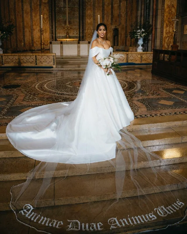 Wedding Dresses with Sequined Floral Motifs and Satin Ribbon Detailing and Lace Trim for an Elegant and Delicate LookPronovias Lynn Wedding Dresses with Sequined Floral Motifs and Satin Ribbon Detailing and Lace Trim for an Elegant and Delicate LookPronovias Lynn