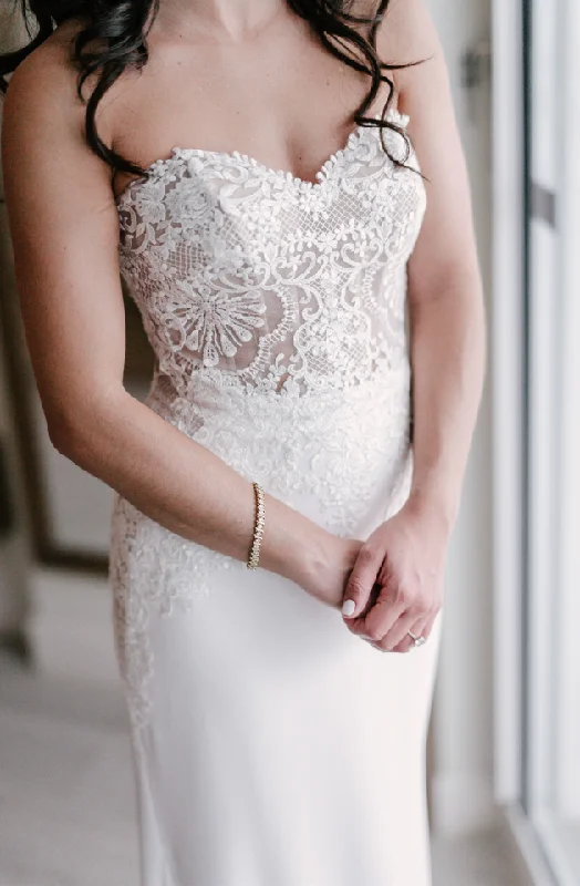 Wedding Dresses with Sequined Stripes and Sheer Back and Embroidered Birds and Belt and Embroidered Floral Patterns for a Bold and Nature Inspired LookPronovias Novak Wedding Dresses with Sequined Stripes and Sheer Back and Embroidered Birds and Belt and Embroidered Floral Patterns for a Bold and Nature Inspired LookPronovias Novak
