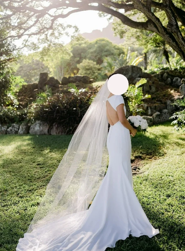 Wedding Dresses with Sequined Geometric Shapes and Lace and Chiffon Blend and Ruffled Sleeves and Belt and Embroidered Skirt for a Modern and Dramatic LookPronovias Valeria Wedding Dresses with Sequined Geometric Shapes and Lace and Chiffon Blend and Ruffled Sleeves and Belt and Embroidered Skirt for a Modern and Dramatic LookPronovias Valeria