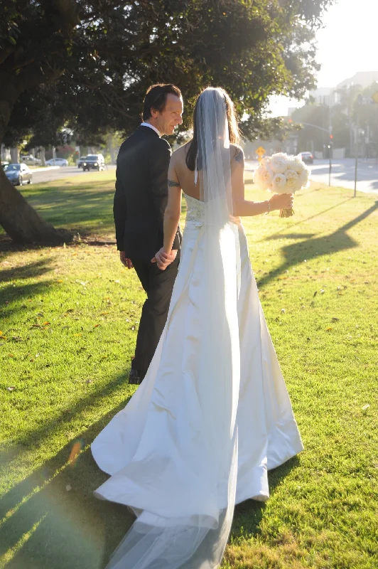 Wedding Dresses with Tassel Hem and Metallic Lace and Sequined Geometric Shapes and Satin Ribbon for a Boho and Luxurious LookReem Acra Silk Satin