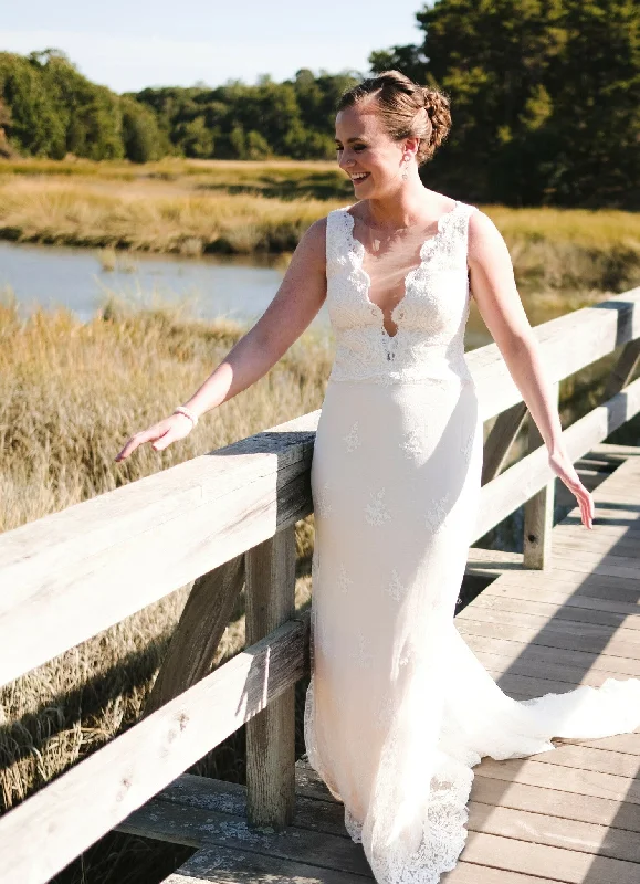 Wedding Dresses with Sheer Sleeve and Sequined Cuffs and Bow at the Waist and Embroidered Skirt and Belt for an Elegant and Intricate LookRomona Keveza L9132 Wedding Dresses with Sheer Sleeve and Sequined Cuffs and Bow at the Waist and Embroidered Skirt and Belt for an Elegant and Intricate LookRomona Keveza L9132