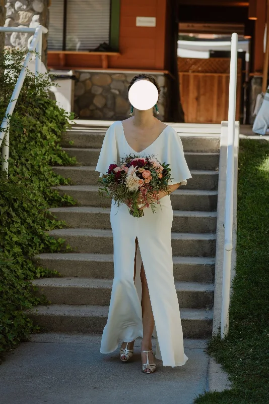 Wedding Dresses with Sheer Sleeve and Sequined Cuffs and Embroidered Bodice and Bow at the Waist for an Elegant and Sparkly LookSarah Seven Kennedy Wedding Dresses with Sheer Sleeve and Sequined Cuffs and Embroidered Bodice and Bow at the Waist for an Elegant and Sparkly LookSarah Seven Kennedy