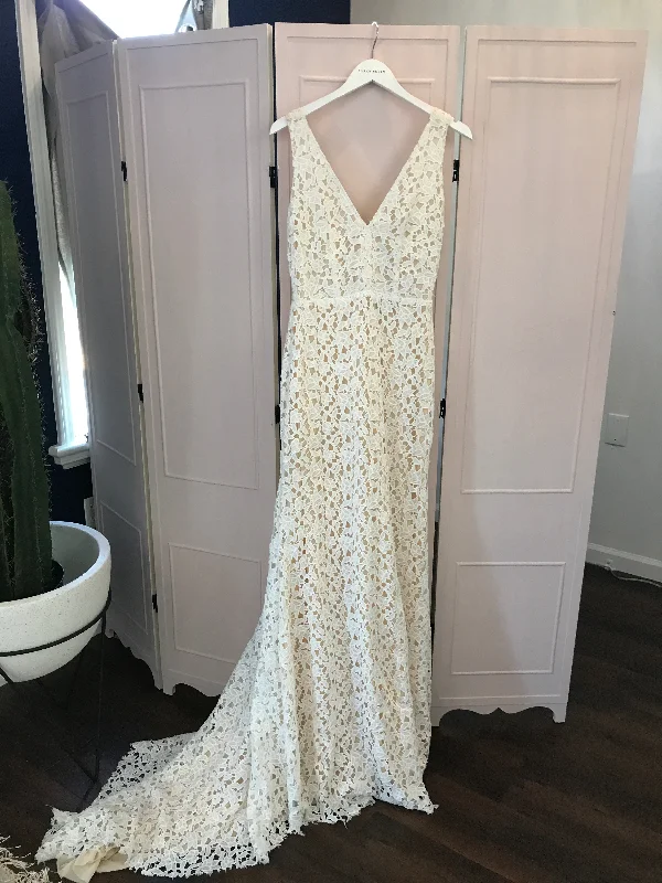 Strapless Wedding Dresses with Tassel Accents and Sequined Belt for a Fun LookSarah Seven Paige Strapless Wedding Dresses with Tassel Accents and Sequined Belt for a Fun LookSarah Seven Paige
