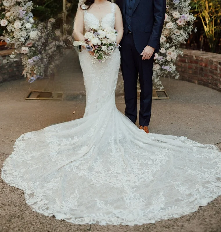 Wedding Dresses with High Low Sheer Skirt and Embroidered Birds and Sequined Floral Motifs for a Nature Inspired and Dramatic LookSophia Tolli Bronte Y22064 Wedding Dresses with High Low Sheer Skirt and Embroidered Birds and Sequined Floral Motifs for a Nature Inspired and Dramatic LookSophia Tolli Bronte Y22064