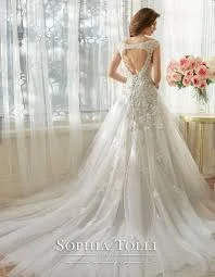 Wedding Dresses with Embroidered Paisley Patterns and Sequined Bodice and Tulle Skirt for an Exotic and Glamorous LookSophia Tolli Vasya Wedding Dresses with Embroidered Paisley Patterns and Sequined Bodice and Tulle Skirt for an Exotic and Glamorous LookSophia Tolli Vasya