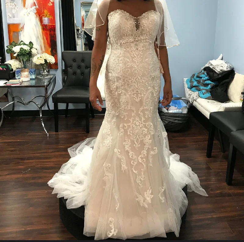 Wedding Dresses with Sequined Floral Motifs and Satin Ribbon Detailing and Lace Trim for an Elegant and Delicate LookStella York 6502 Wedding Dresses with Sequined Floral Motifs and Satin Ribbon Detailing and Lace Trim for an Elegant and Delicate LookStella York 6502