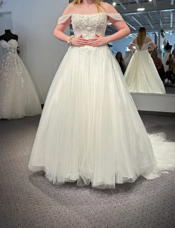 Wedding Dresses with Beaded Waistbands and Tiered Skirts and Lace Overlay for a Glamorous and Feminine LookStella York 7646 Wedding Dresses with Beaded Waistbands and Tiered Skirts and Lace Overlay for a Glamorous and Feminine LookStella York 7646