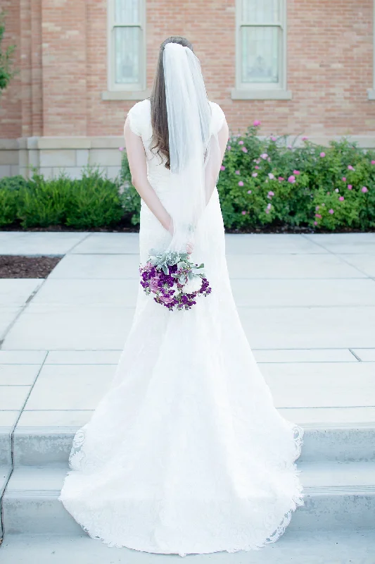 Wedding Dresses with Sheer Panels and Sequined Trim and Belt for a Sultry and Sparkly LookStella York High V-Neck Cap Sleeve Fit and Flare Wedding Dress Wedding Dresses with Sheer Panels and Sequined Trim and Belt for a Sultry and Sparkly LookStella York High V-Neck Cap Sleeve Fit and Flare Wedding Dress