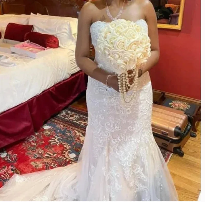 Wedding Dresses with High Neck and Embroidered Back and Sheer Sleeves for a Modest and Intricate LookStella York Ivory & Champagne Strapless Mermaid Wedding Dresses with High Neck and Embroidered Back and Sheer Sleeves for a Modest and Intricate LookStella York Ivory & Champagne Strapless Mermaid