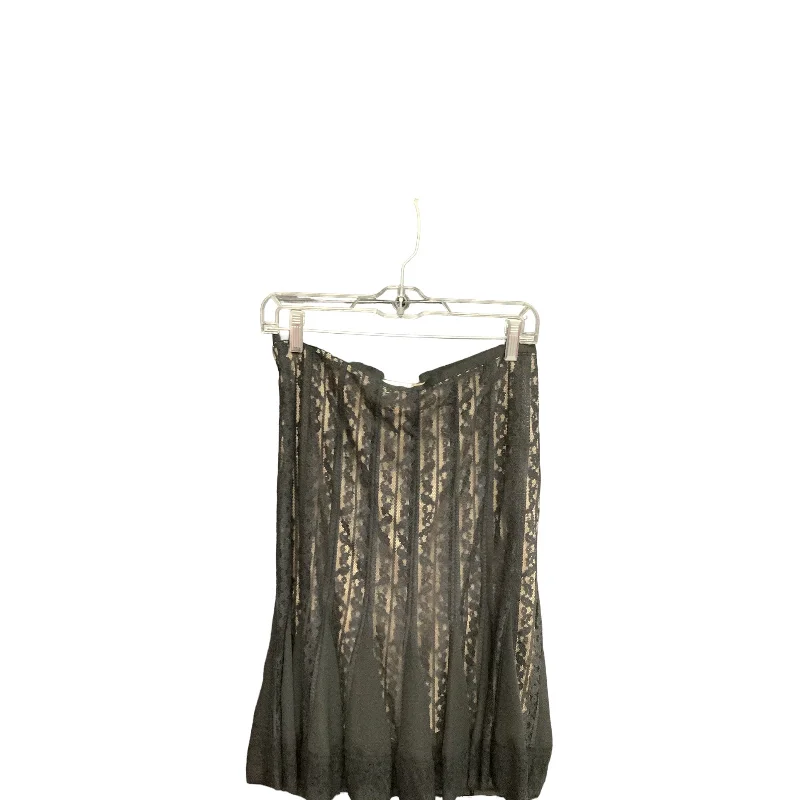 Tiered skirts in a monochromatic color schemeSkirt Maxi By Loft  Size: 4