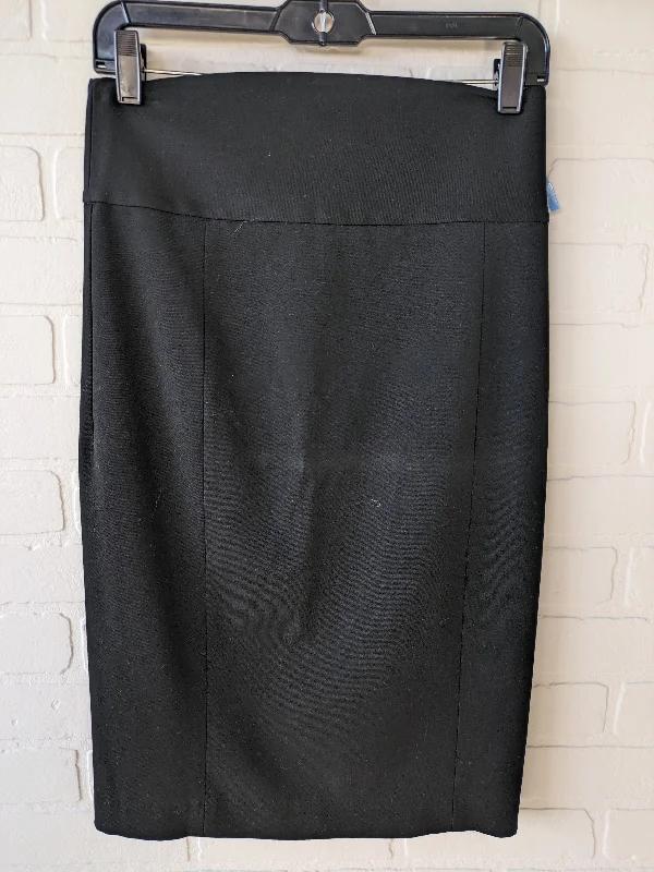 Skirts with a button front placketSkirt Midi By Express  Size: 4