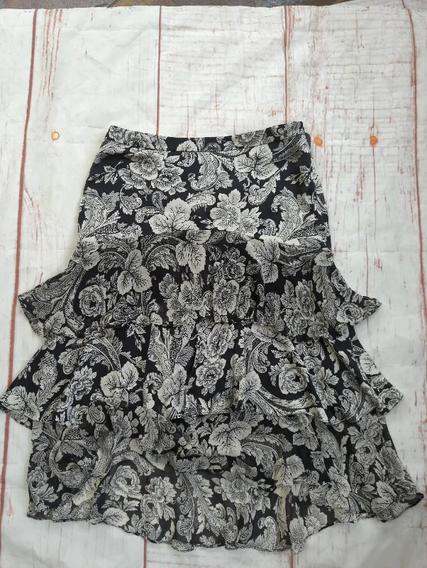 Long skirts with a slit up the frontSkirt Midi By White House Black Market Size: 6 Long skirts with a slit up the frontSkirt Midi By White House Black Market Size: 6