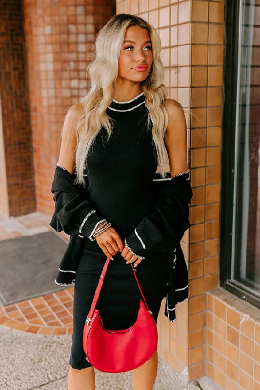 Asymmetric hem midi dress for a unique and fashionable styleL.A Bound Knit Midi in Black